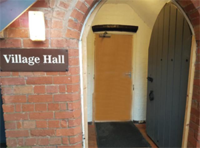 village hall door and sign